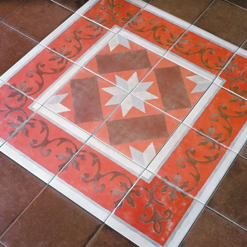 Piastrella decorata cementina decoro rosso
